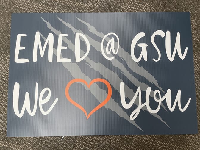 An image of a grey personalized GSU graduation sign.